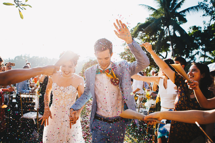 Outdoor Destination Luxury Adventure Ubud Ceremony Bride Colorful Flower Crown Tropical Floral Arch Confetti | Whimsical Exotic Tropical Jungle Wedding Bali http://www.cecilephotographybali.com/