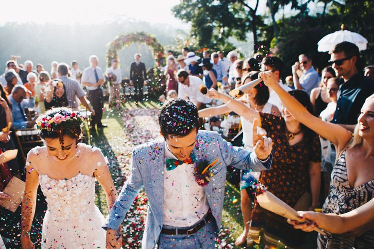 Outdoor Destination Luxury Adventure Ubud Ceremony Bride Colorful Flower Crown Tropical Floral Arch Confetti | Whimsical Exotic Tropical Jungle Wedding Bali http://www.cecilephotographybali.com/