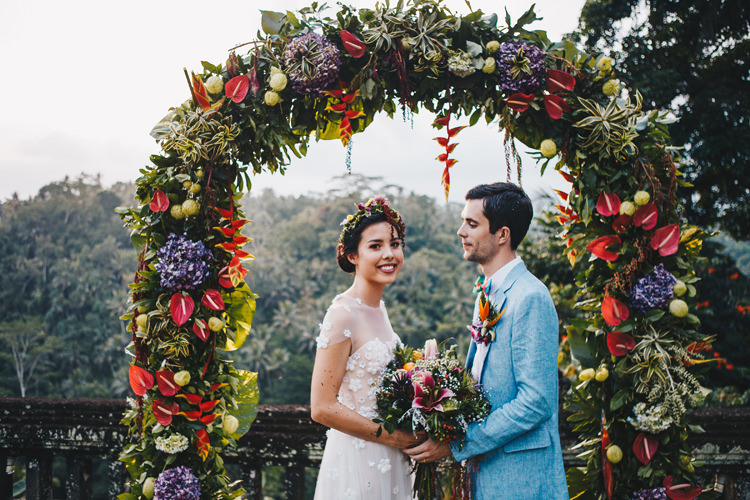 Outdoor Destination Luxury Adventure Ubud Ceremony Colorful Flower Crown Tropical Bouquet Floral Arch Crown Bride Groom | Whimsical Exotic Tropical Jungle Wedding Bali http://www.cecilephotographybali.com/