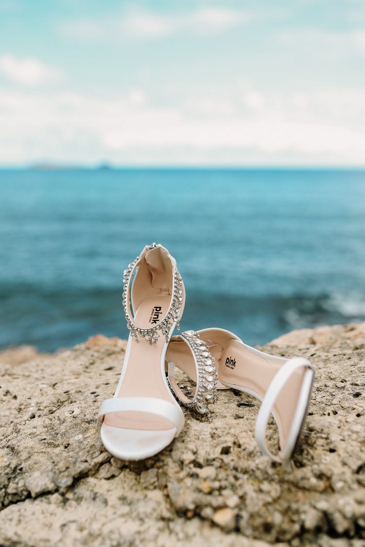 Spain Sun Outdoor Tropical Mediterranean Garden Villa Sea Bride White Shoes | Ibiza Destination Wedding Amy Faith Photography