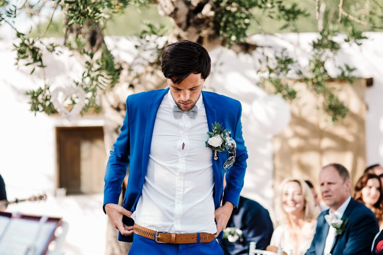 Spain Sun Outdoor Tropical Mediterranean Garden Villa Outdoor Ceremony Groom Blue Suit | Ibiza Destination Wedding Amy Faith Photography