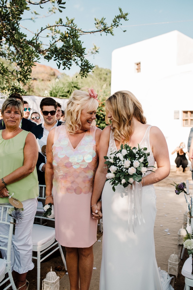 Spain Sun Outdoor Tropical Mediterranean Garden Villa Outdoor Ceremony Aisle Mother Bride | Ibiza Destination Wedding Amy Faith Photography