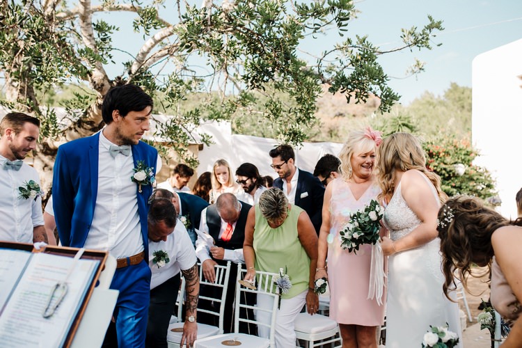 Spain Sun Outdoor Tropical Mediterranean Garden Villa Outdoor Ceremony Groom Mother Bride Aisle | Ibiza Destination Wedding Amy Faith Photography