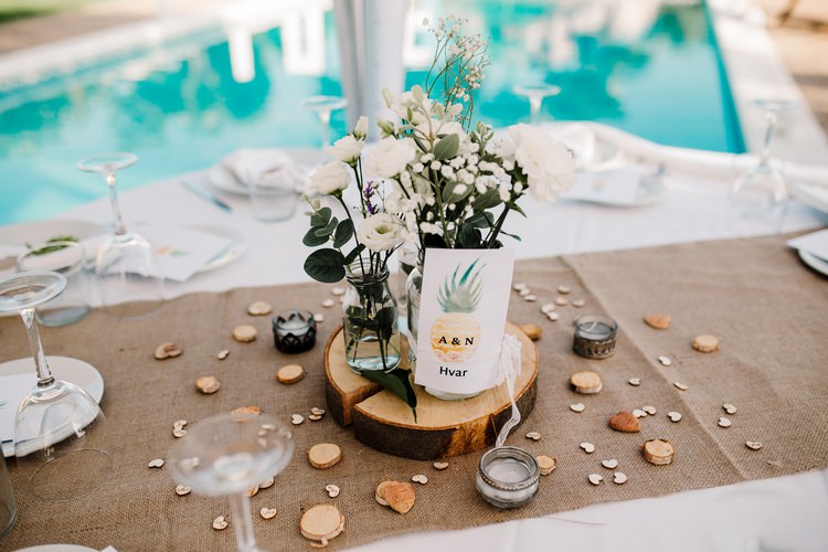 Spain Sun Outdoor Tropical Mediterranean Garden Villa Outdoor Reception Rustic Hessian Table | Ibiza Destination Wedding Amy Faith Photography