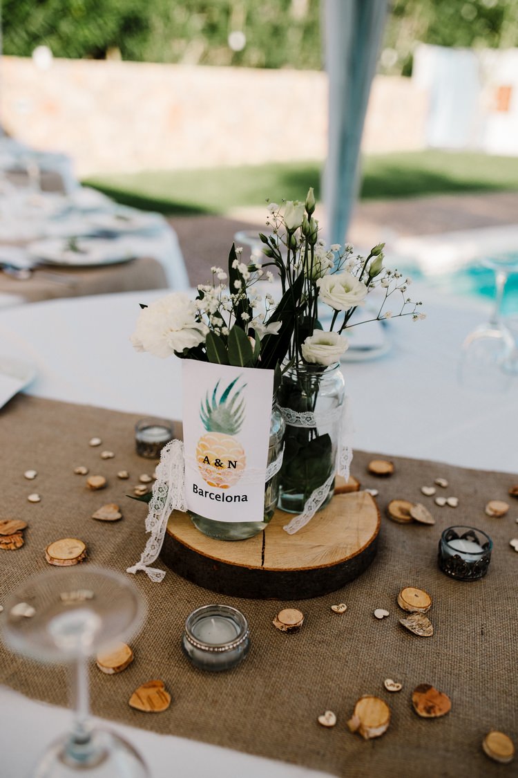 Spain Sun Outdoor Tropical Mediterranean Garden Villa Outdoor Reception Rustic Hessian Table | Ibiza Destination Wedding Amy Faith Photography