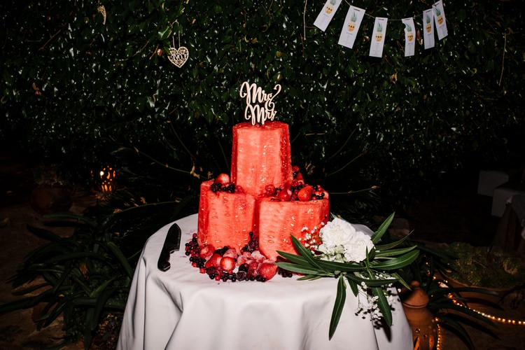 Spain Sun Outdoor Tropical Mediterranean Garden Villa Outdoor Reception Watermelon Cake | Ibiza Destination Wedding Amy Faith Photography