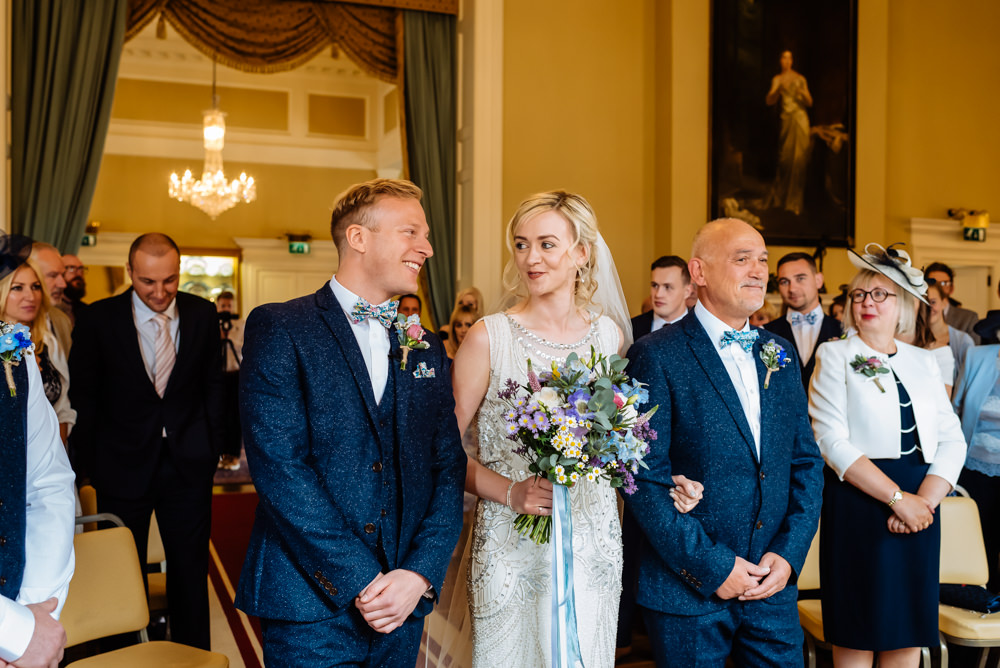 Bride Bridal Jenny Packham Beaded Dress Gown Shift Embellished Bouquet Wild Flower Meadow Ribbons Blue Tweed Next Bow Tie Liberty Print Laid Back Harry Potter Wedding Daffodil Waves Photography