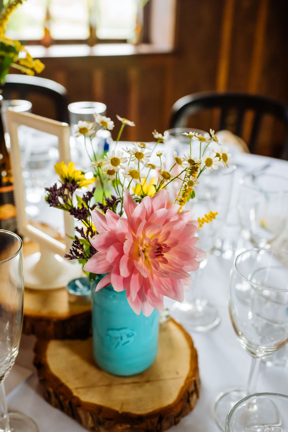Table Centre Wood Slice Blue Painted Jar Flowers Floral Daisies Laid Back Harry Potter Wedding Daffodil Waves Photography