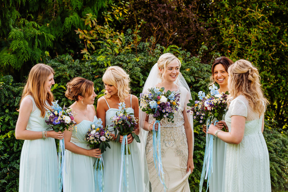 Bride Bridal Jenny Packham Beaded Dress Gown Shift Embellished Bouquet Wild Flower Meadow Ribbons Pale Blue Bridesmaids Mismatched Laid Back Harry Potter Wedding Daffodil Waves Photography