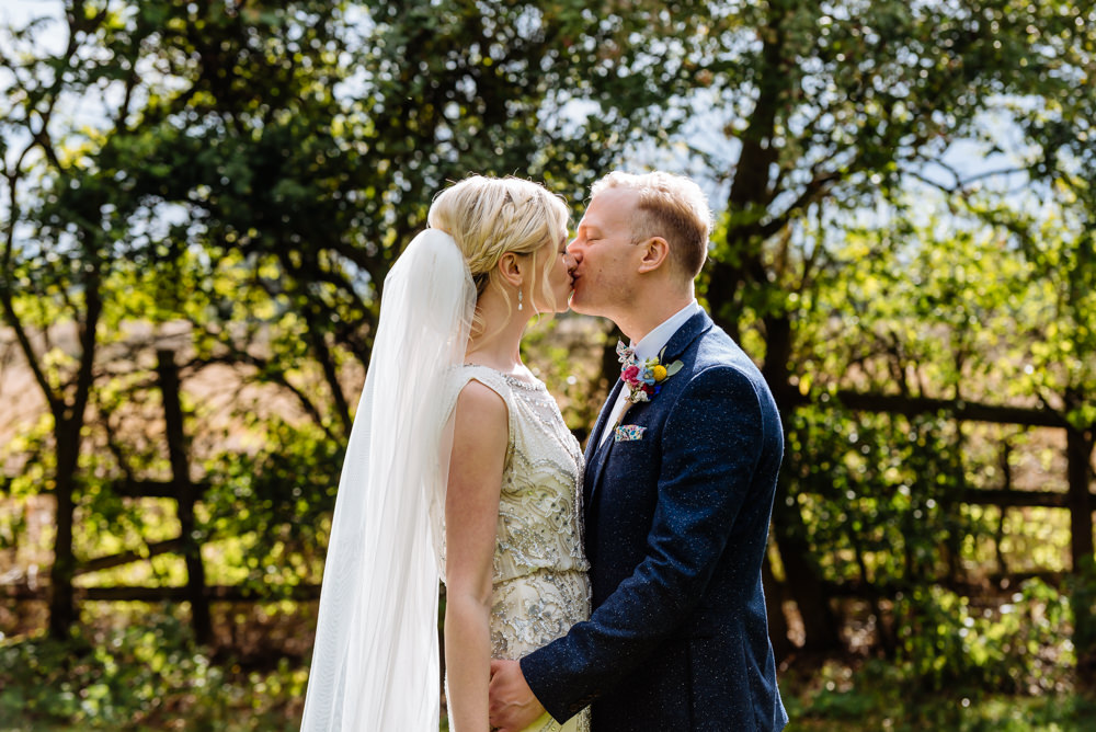 Bride Bridal Jenny Packham Beaded Dress Gown Shift Embellished Blue Tweed Next Bow Tie Liberty Print Groom Three Piece Laid Back Harry Potter Wedding Daffodil Waves Photography