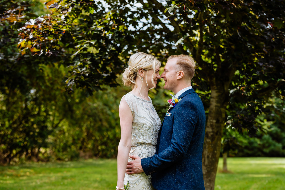 Bride Bridal Jenny Packham Beaded Dress Gown Shift Embellished Blue Tweed Next Bow Tie Liberty Print Groom Three Piece Laid Back Harry Potter Wedding Daffodil Waves Photography