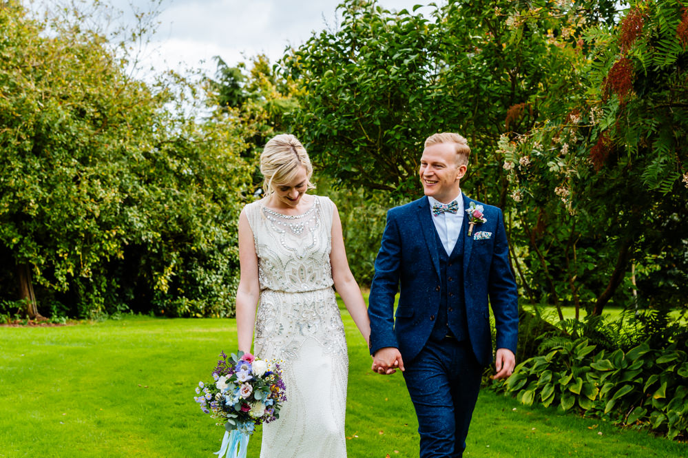Bride Bridal Jenny Packham Beaded Dress Gown Shift Embellished Blue Tweed Next Bow Tie Liberty Print Groom Three Piece Bouquet Wild Flowers Meadow Ribbons Laid Back Harry Potter Wedding Daffodil Waves Photography