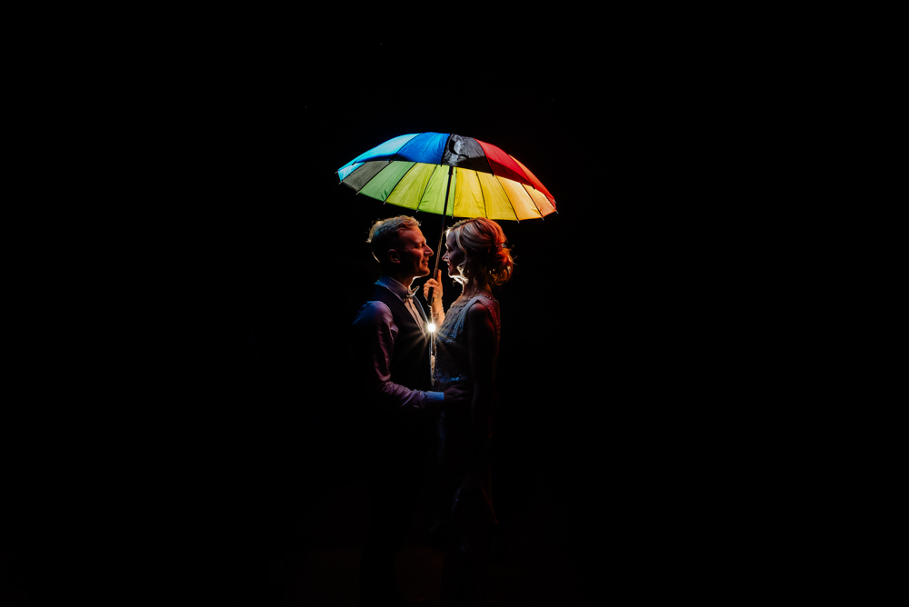 Couples Portrait Rainbow Umbrella Laid Back Harry Potter Wedding Daffodil Waves Photography