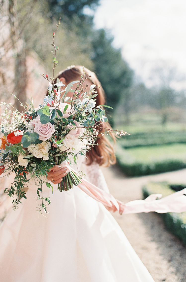 Flowers Poppies Anemones Delphiniums Ranunculus Snakeshead Fritillary Grape Hyacinth Colourful Bouquet Bride Bridal Ribbon Whimsical Summer Chocolat Wedding Ideas Brympton House Liz Baker Fine Art Photography