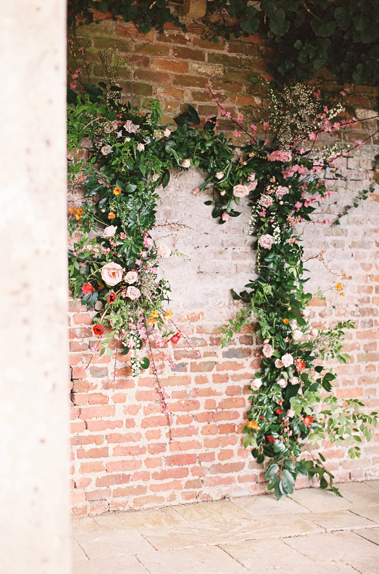 Flowers Poppies Anemones Delphiniums Ranunculus Snakeshead Fritillary Grape Hyacinth Colourful Backdrop Installation Whimsical Summer Chocolat Wedding Ideas Brympton House Liz Baker Fine Art Photography