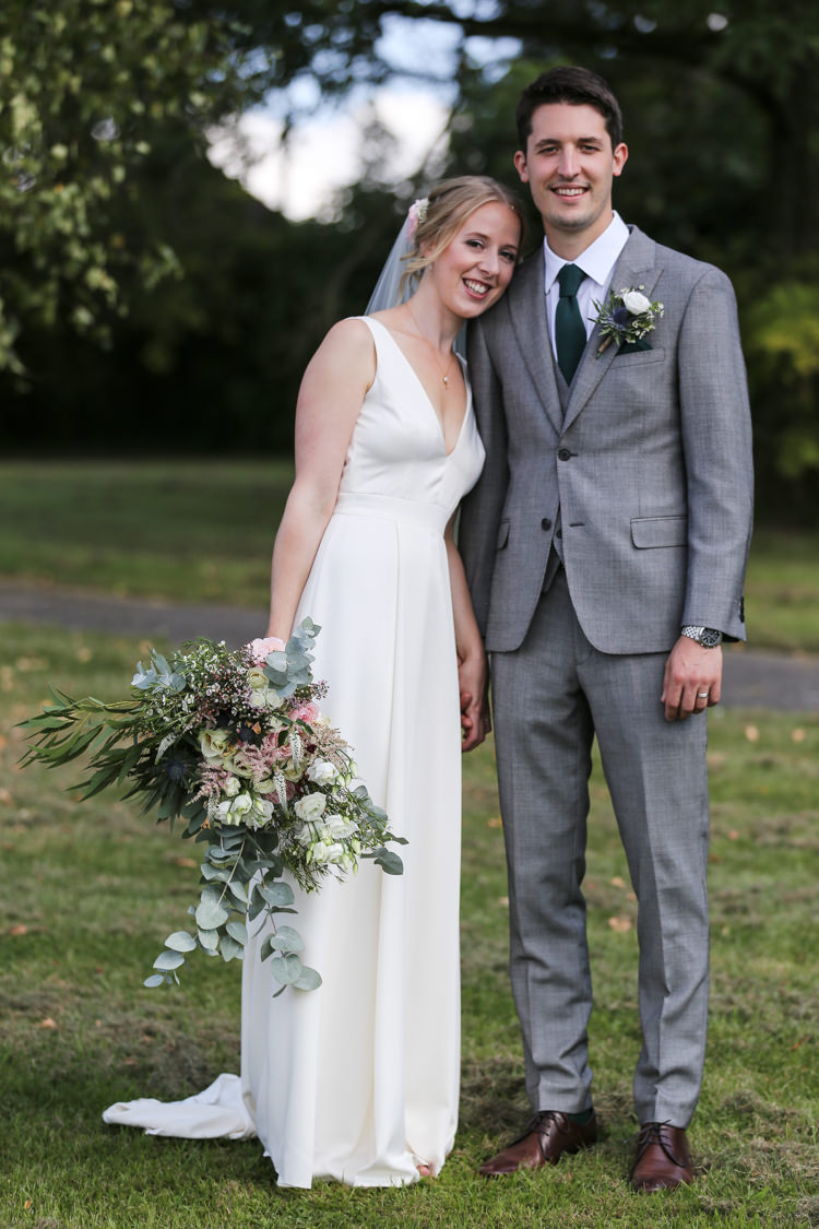 Bride Bridal V Neck Charlie Brear Dress Gown Ted Baker Groom Waistcoat Three Piece Grey Green Tie Loose Wild Bouquet Manor Farm Wedding Hampshire Luke Doyle Photography