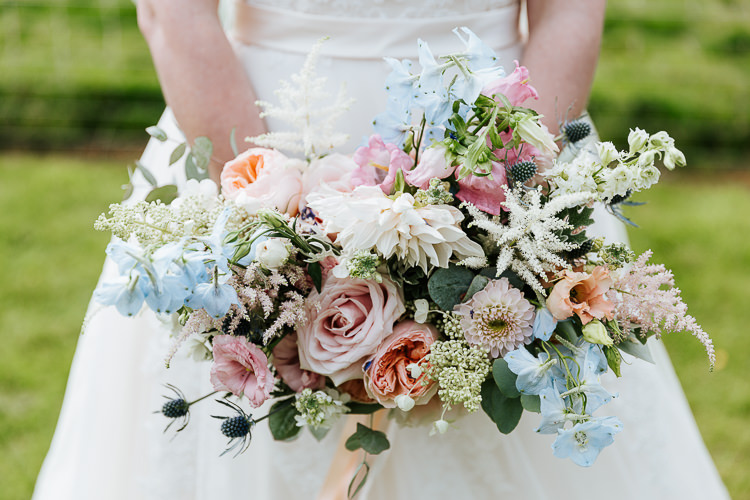 Bouquet Bride Bridal Delphiniums Roses Stocks Pink Blue White Flowers Rose Dahlia Astilbe Pretty Pastel Floral Village Hall Wedding Struve Photography