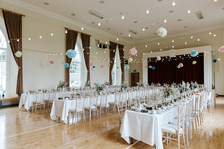 Festoon Lights Pompoms Decor Reception Pretty Pastel Floral Village Hall Wedding Struve Photography