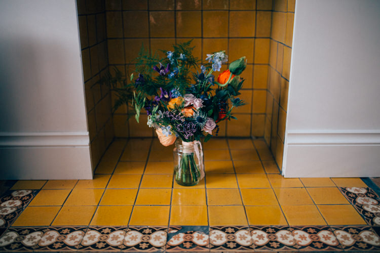 Bride Bridal Bouquet Multicoloured Colourful Thistle Rose Orange Blue Round Chapel London Wedding Nikki van der Molen Photography