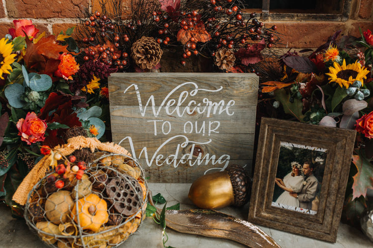 Wooden Welcome Sign Table Multicoloured Colourful Autumnal Flowers Photographs Shustoke Farm Barns Wedding Ellie Grace Photography