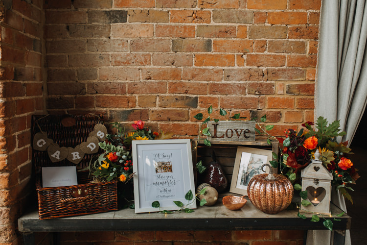 Cards Autumn Table Lantern Pumpkin Wicker Basket Bunting Wooden Sign Shustoke Farm Barns Wedding Ellie Grace Photography