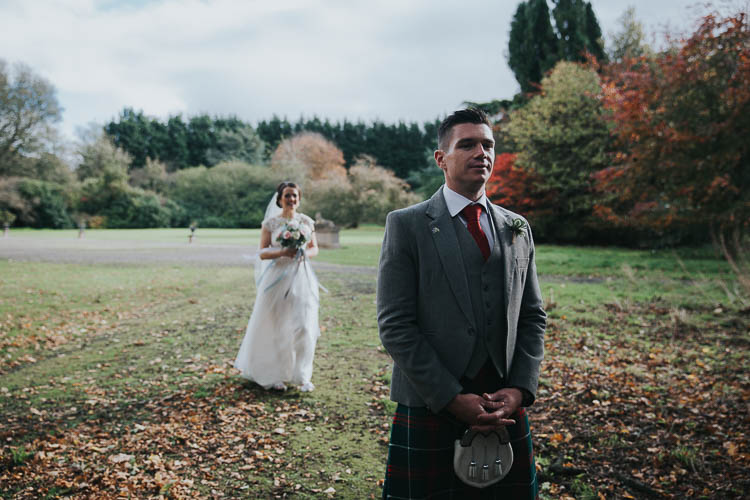 Bride Bridal Dress Gown Lace Sweetheart Neckline Short Sleeve Full Skirt Kilt Groom Tartan Waistcoat Red Green First Look Bouquet The Byre at Inchyra Wedding Jen Owens Images
