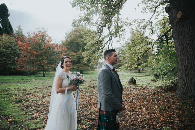 Bride Bridal Dress Gown Lace Sweetheart Neckline Short Sleeve Full Skirt Kilt Groom Tartan Waistcoat Red Green First Look Bouquet The Byre at Inchyra Wedding Jen Owens Images