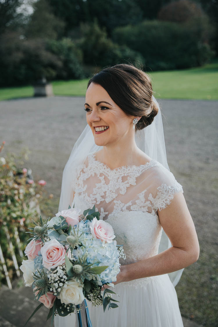 Bride Bridal Dress Gown Lace Sweetheart Neckline Short Sleeve Full Skirt Bouquet Blue Hydrangea Pink Rose Eucalyptus Thistle The Byre at Inchyra Wedding Jen Owens Images
