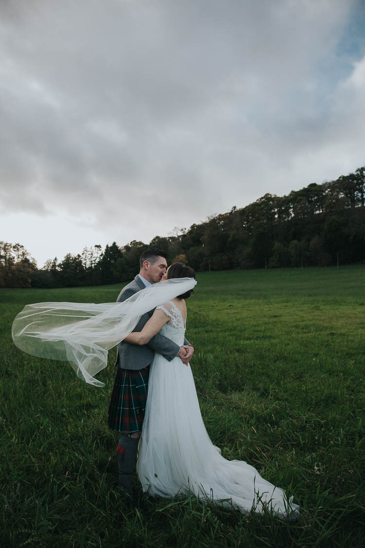 Bride Bridal Dress Gown Lace Sweetheart Neckline Short Sleeve Full Skirt Kilt Groom Tartan Waistcoat Red Green Veil The Byre at Inchyra Wedding Jen Owens Images