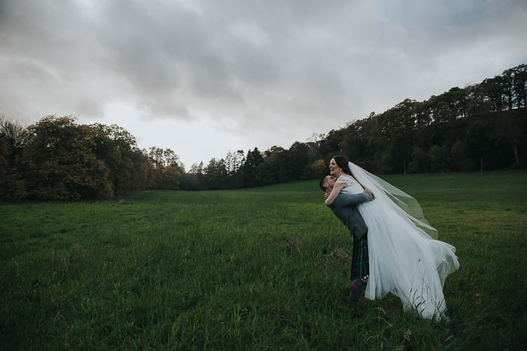 Bride Bridal Dress Gown Lace Sweetheart Neckline Short Sleeve Full Skirt Kilt Groom Tartan Waistcoat Red Green Veil The Byre at Inchyra Wedding Jen Owens Images