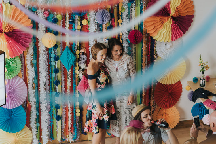 Streamers Pom Poms Paper Pin Wheels Backdrop Photo Booth The Workstation Cinema Colourful Wedding Bloom Weddings