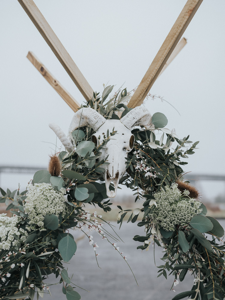 Flowers Blush Pink Greenery Foxgloves Larkspur Ammi Rose Ranunculus Hellebores Olive Eucalyptus Skull Alternative Edgy Naked Tipi Backdrop Wedding Ideas http://www.ivoryfayre.com/