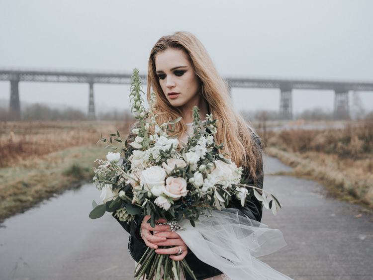Bouquet Flowers Bride Bridal Blush Pink Greenery Foxgloves Larkspur Ammi Rose Ranunculus Hellebores Olive Eucalyptus Alternative Edgy Naked Tipi Backdrop Wedding Ideas http://www.ivoryfayre.com/