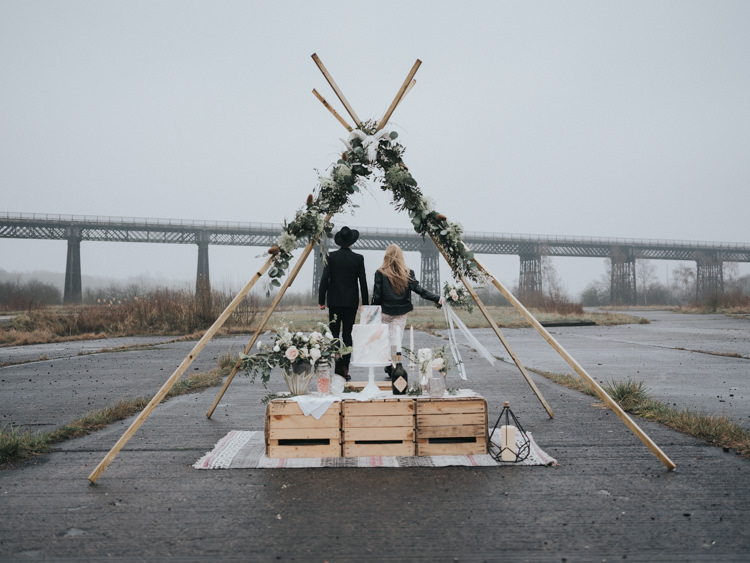 Alternative Edgy Naked Tipi Backdrop Wedding Ideas http://www.ivoryfayre.com/