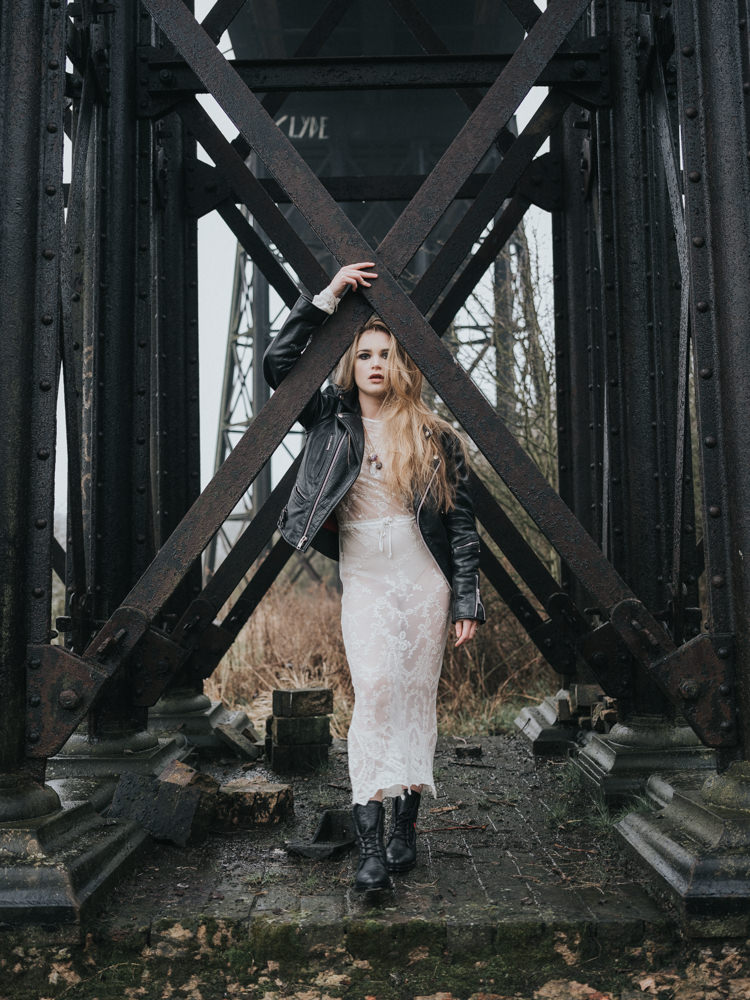 Bride Bridal Lace Sheer Dress Gown Leather Jacket Boots Alternative Edgy Naked Tipi Backdrop Wedding Ideas http://www.ivoryfayre.com/