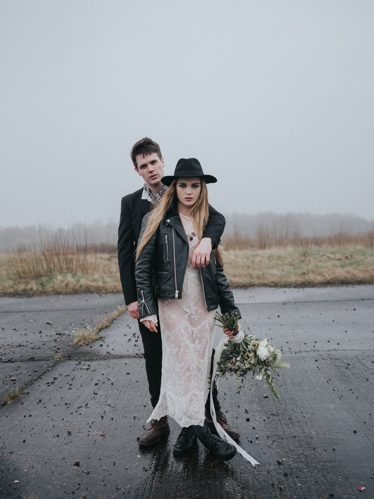 Bride Bridal Lace Sheer Dress Gown Leather Jacket Boots Hat Alternative Edgy Naked Tipi Backdrop Wedding Ideas http://www.ivoryfayre.com/