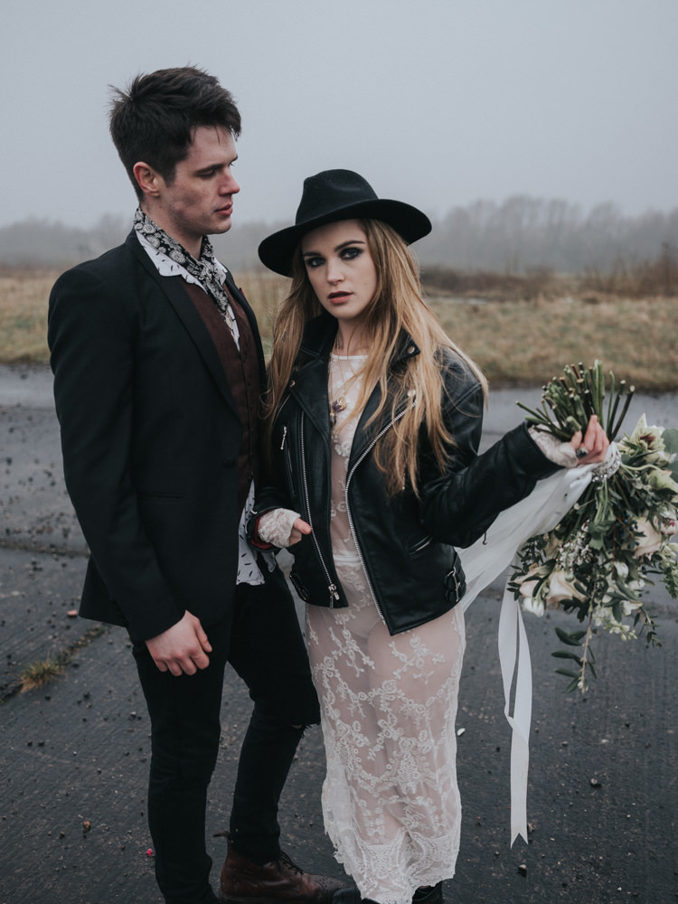 Bride Bridal Lace Sheer Dress Gown Leather Jacket Boots Hat Alternative Edgy Naked Tipi Backdrop Wedding Ideas http://www.ivoryfayre.com/