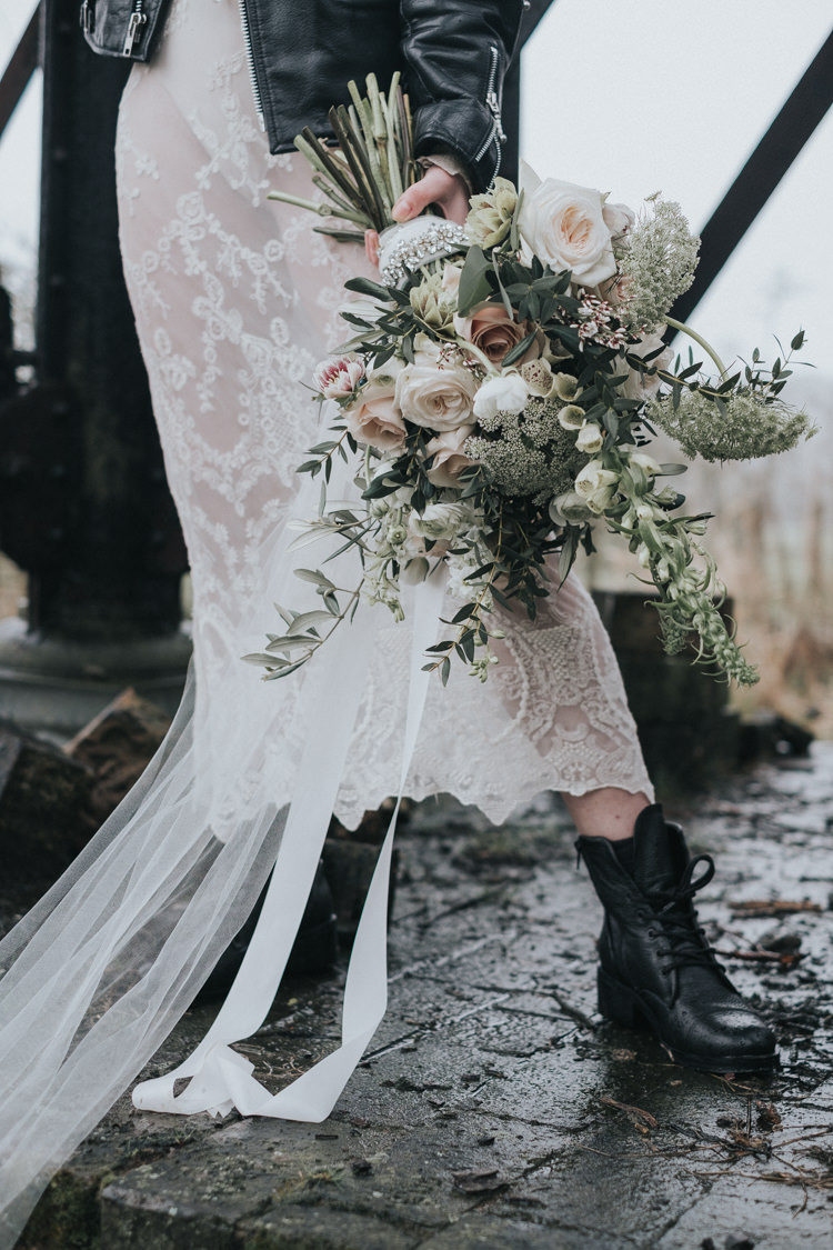 Bouquet Flowers Bride Bridal Blush Pink Greenery Foxgloves Larkspur Ammi Rose Ranunculus Hellebores Olive Eucalyptus Alternative Edgy Naked Tipi Backdrop Wedding Ideas http://www.ivoryfayre.com/