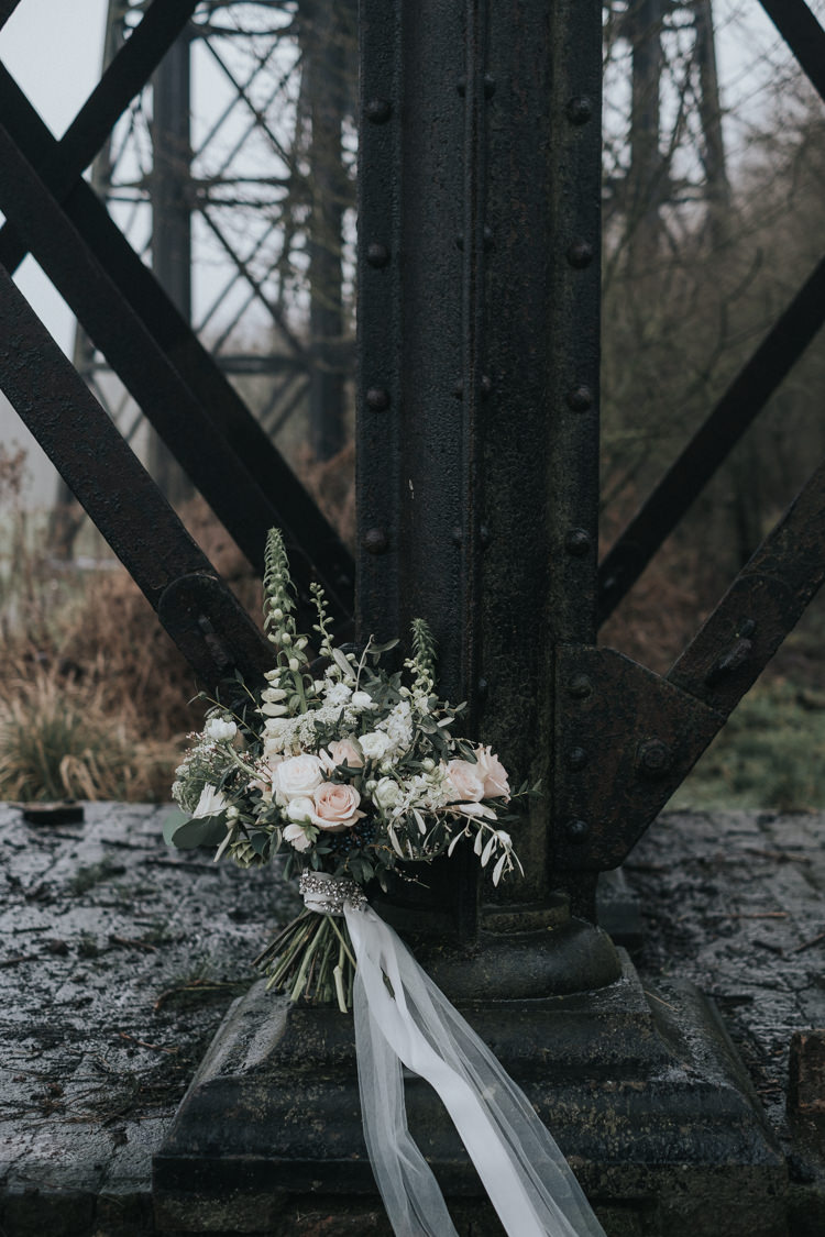 Bouquet Flowers Bride Bridal Blush Pink Greenery Foxgloves Larkspur Ammi Rose Ranunculus Hellebores Olive Eucalyptus Tulle Ribbon Alternative Edgy Naked Tipi Backdrop Wedding Ideas http://www.ivoryfayre.com/
