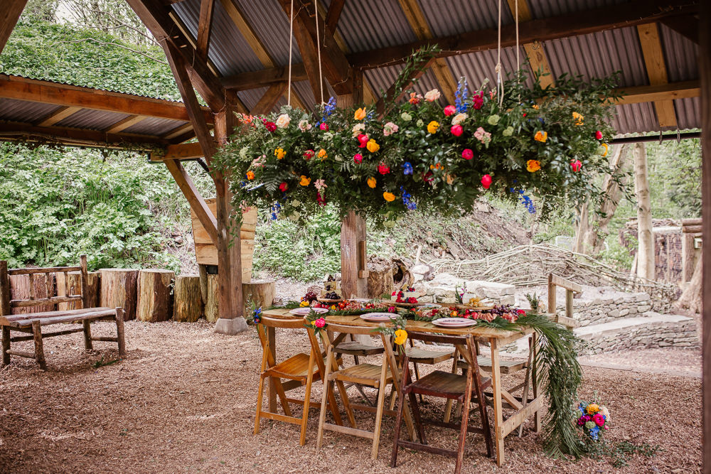 Outdoor Colourful Woodland Table Tablescape Decor Hanging Suspended Flowers Greenery Arnos Vale Weddings Ideas When Charlie Met Hannah Photography