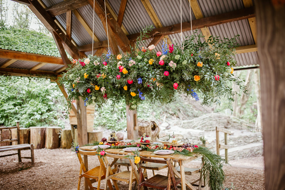 Outdoor Colourful Woodland Table Tablescape Decor Hanging Suspended Flowers Greenery Arnos Vale Weddings Ideas When Charlie Met Hannah Photography