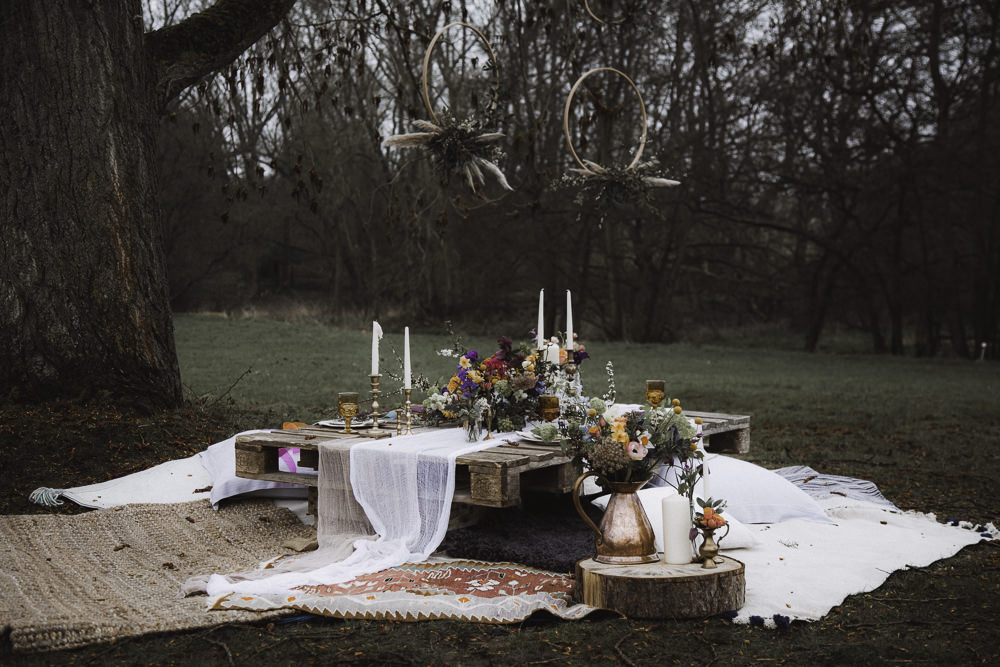 Wooden Pallet Table Rugs Flowers Decor Tablescape Candles Colourful Boho Festival Wedding Ideas Ella Violet Photography