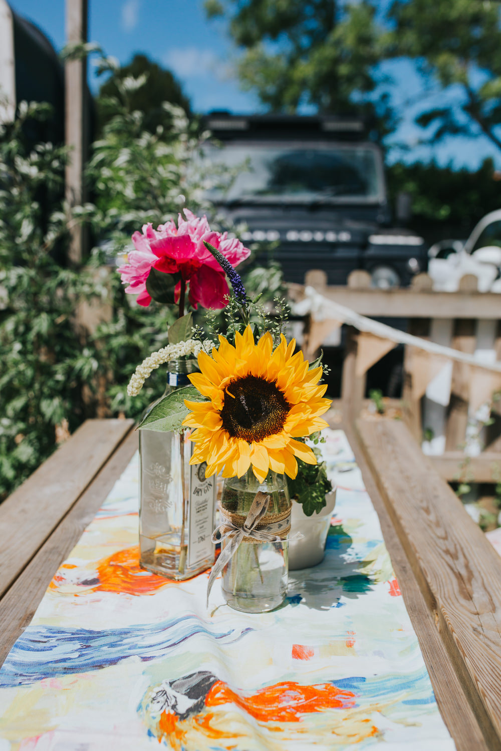 Bottle Jar Flowers Sunflower Table Decor Colourful Bright Summer Pub Wedding Charlotte Razzell Photography
