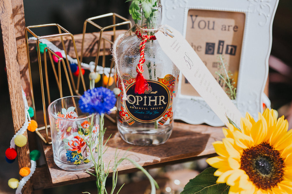 Gin Bottle Seating Plan Table Chart Flowers Wooden Ladder Colourful Bright Summer Pub Wedding Charlotte Razzell Photography