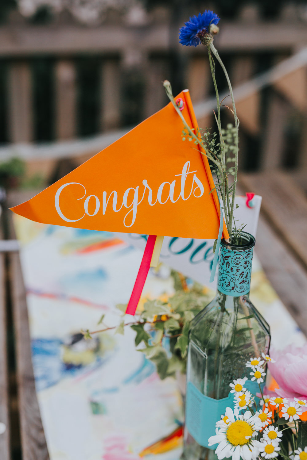 Bottle Jar Flowers Congrats Banner Flag Table Decor Colourful Bright Summer Pub Wedding Charlotte Razzell Photography