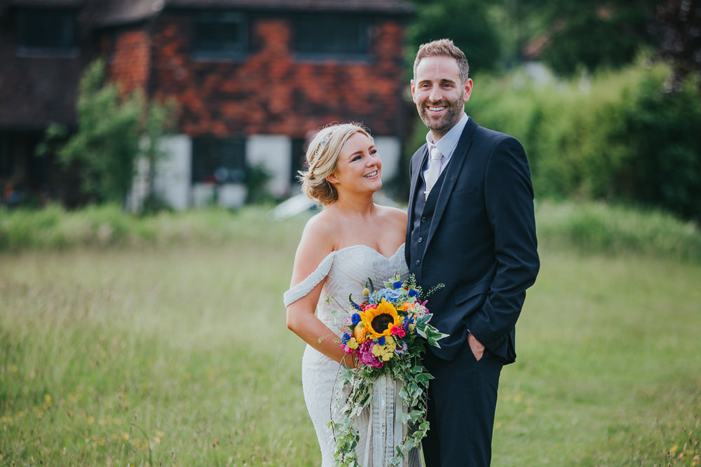 Groom Navy Suit White Tie Colourful Bright Summer Pub Wedding Charlotte Razzell Photography