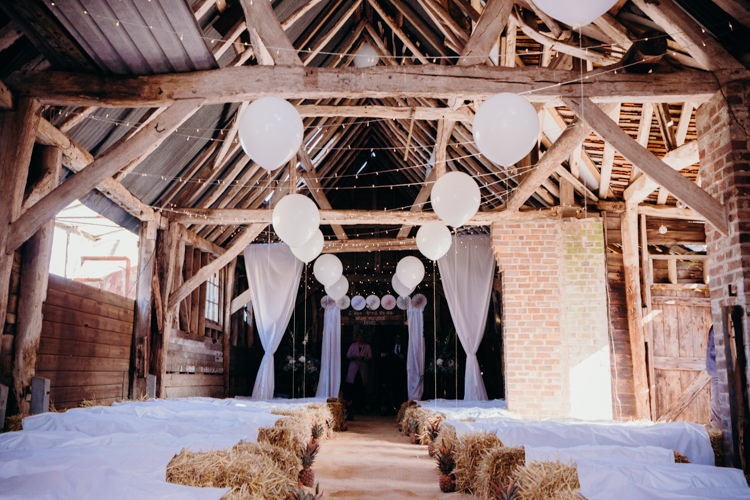 Ceremony Decor Hay Bales Balloons Pinwheels Fairy Lights Creative Hertfordshire Barn Boho DIY Wedding Beard and Mane Photography