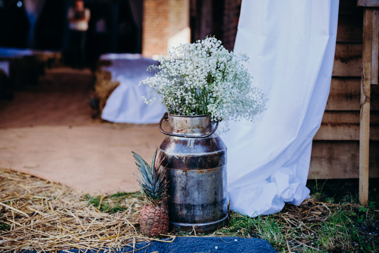 Milk Churns Flowers Gypsophila Pineapple Creative Hertfordshire Barn Boho DIY Wedding Beard and Mane Photography