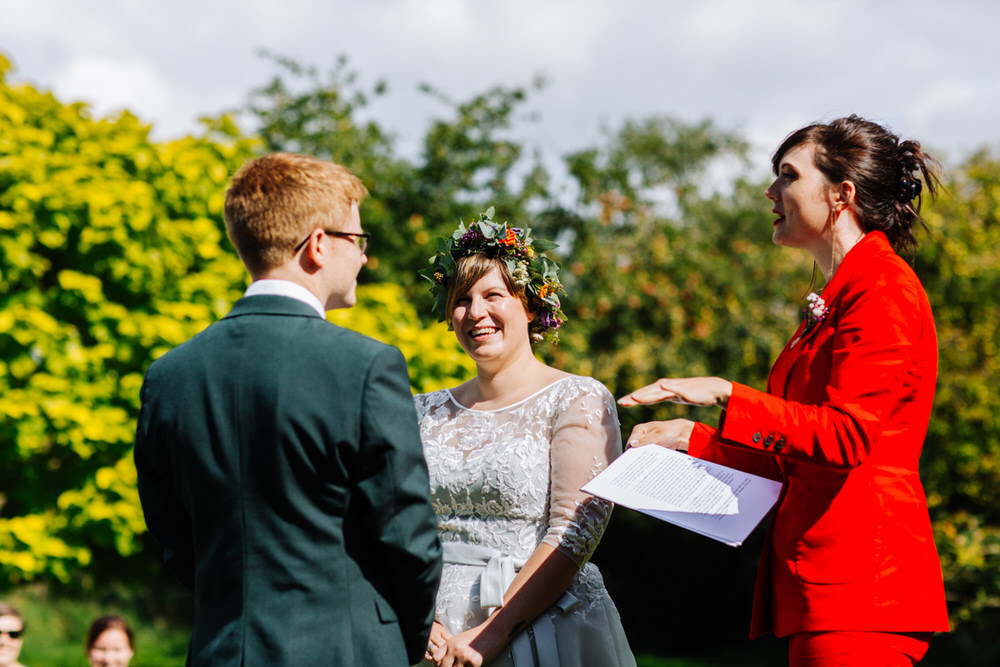 Bride Bridal Tea Length Dress lace Long Sleeve Flower Crown Bottle Green Groom Suit Secret Barn Sussex Wedding Rainbow Colourful Yvonne Lishman Photography