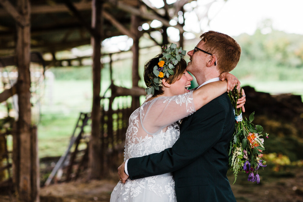 Bride Bridal Tea Length Sleeved Dress Flower Crown Multicoloured Bouquet Flower Crown Groom Bottle Green Suit Three Piece Secret Barn Sussex Wedding Rainbow Colourful Yvonne Lishman Photography